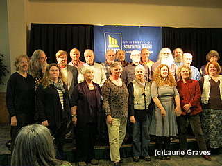 In the front row, Susan Gagnon is third from the left, and Claire Hersom is fourth from the left.