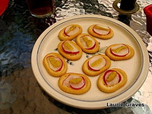 Appetizers---radishes with a bit of mustard on crackers---on the patio