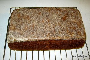 Upside down pumpkin bread with parchment paper on the bottom